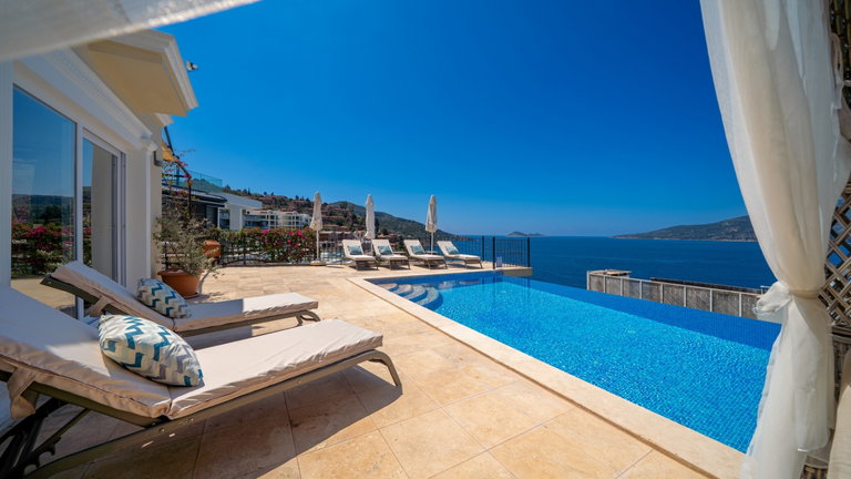 Pool terrace at Villa Komurluk looking out over the sea near Kalkan